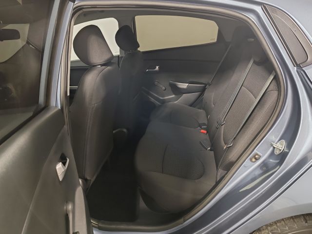 Купить б/у Kia Rio, 2014 год, 107 л.с. в России